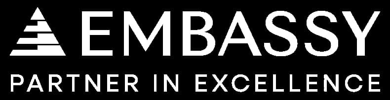 Embassy white logo